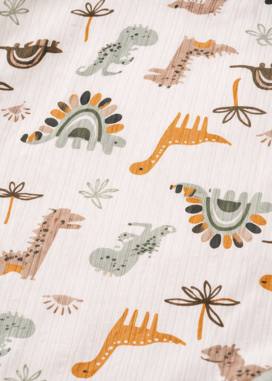 Mameluco / Body Blanco Estampado Dinosaurios Manga Corta